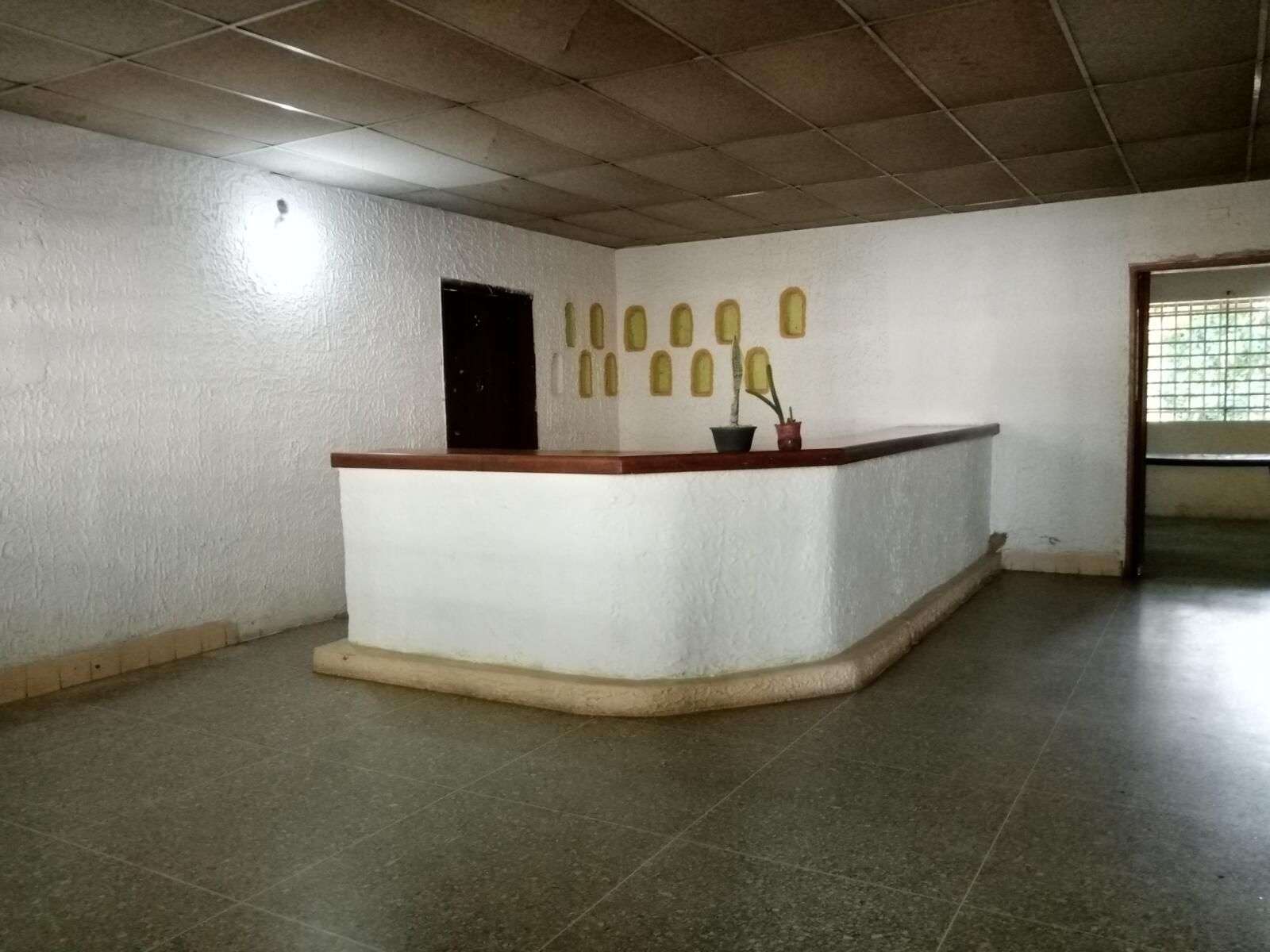 10 Venta Casa con Terreno de 2.687 m2 y Mini Locales